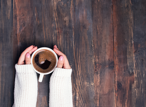 Hands holding warm cup of coffee - Coffee Subscription - Terranova Coffee Company